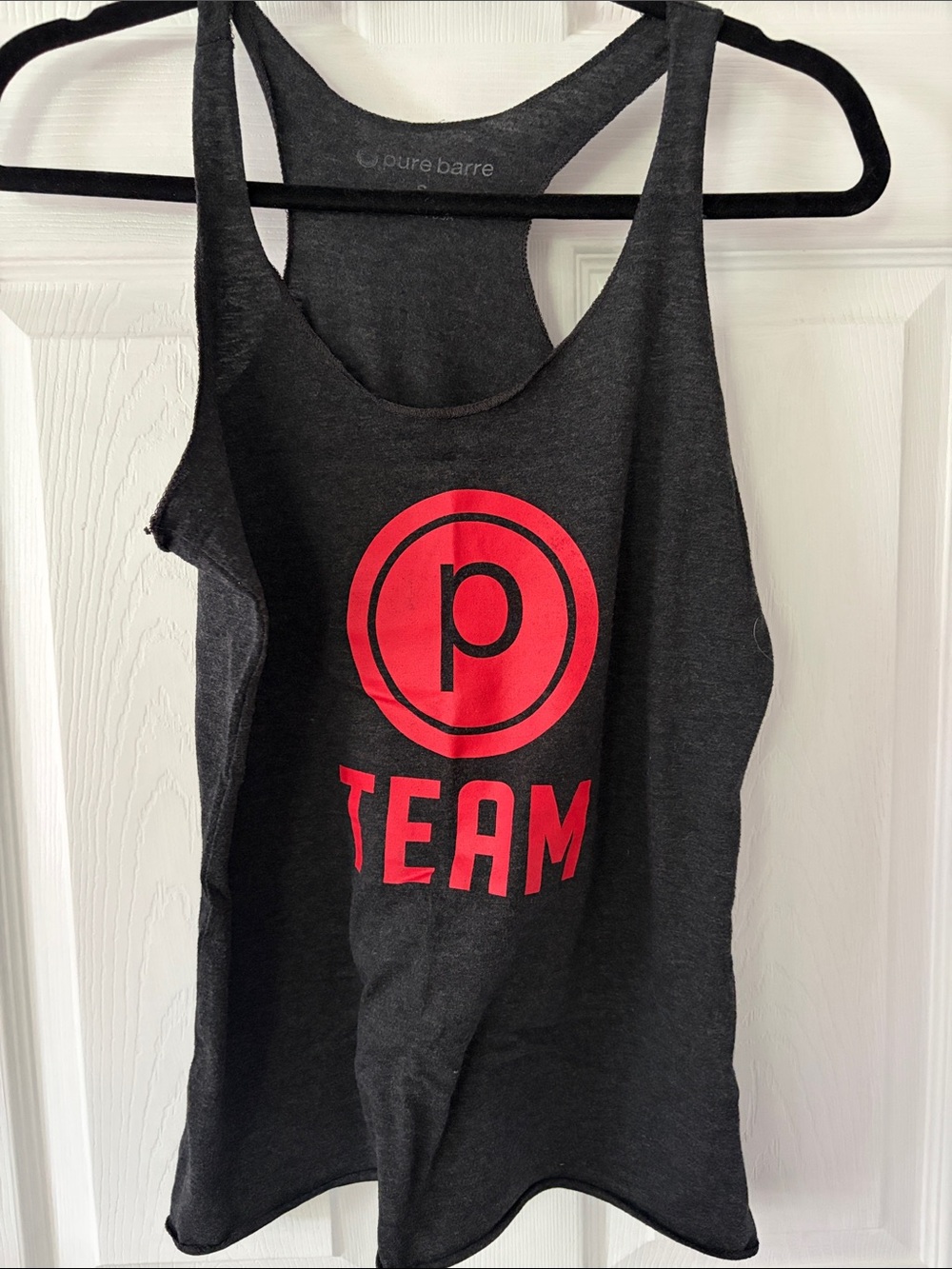 Pure Barre Black Racerback Tank with Red TEAM Graphic